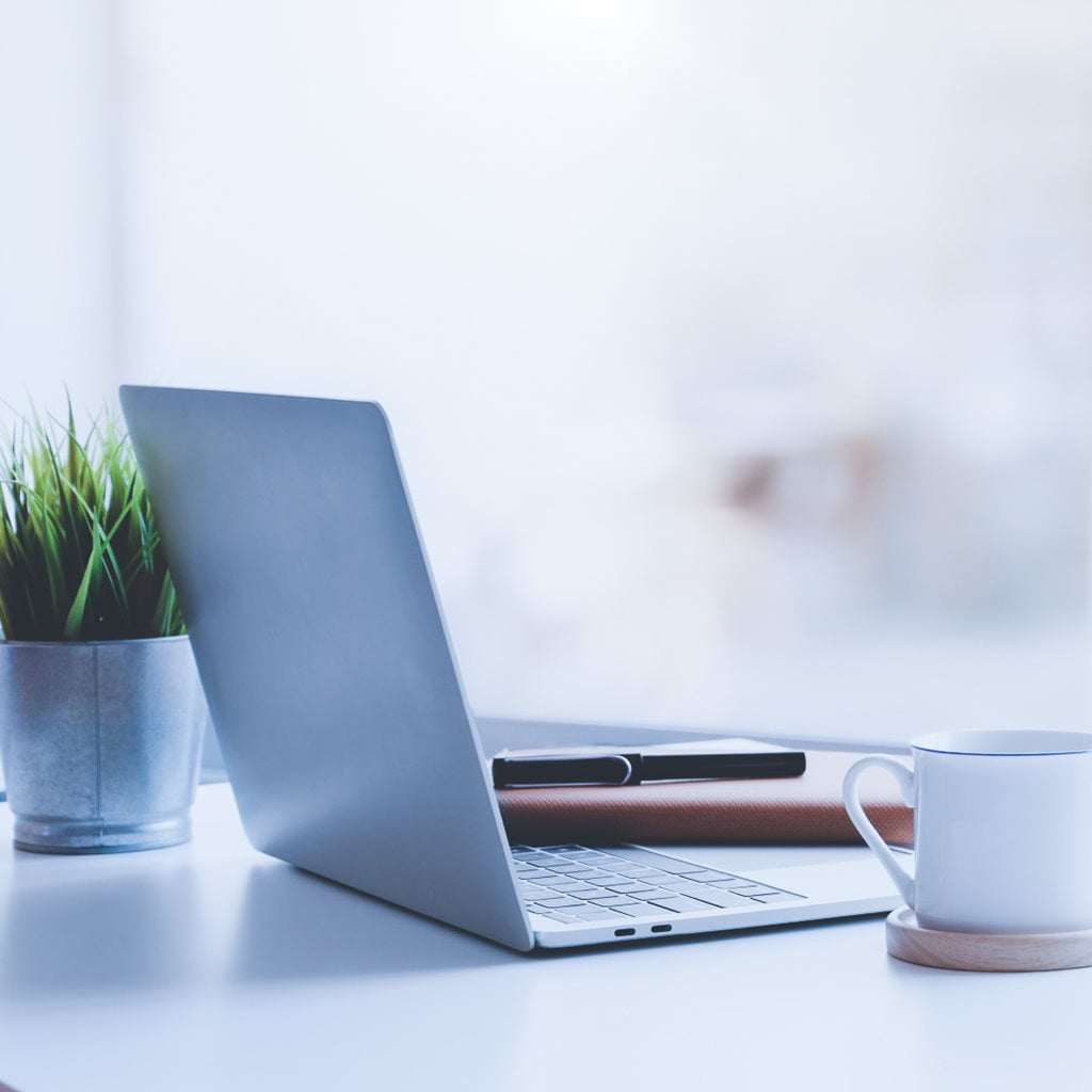 Computer sitting on an office desk