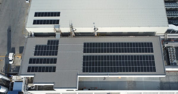 birds eye view of Allegro building with solar panels