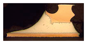 Figure 7: Photographic Actual Cross Section Showing a Solid Solder Fillet, that is Optically Inspectable, has Formed with the PCB Board