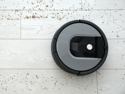 Vacuum robot cleaning the dirty floor.